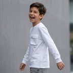 Polo blanco manga larga para niño ANG Kidz – detalle bolsillo cargo funcional