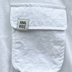 Polo manga larga blanco ANG Kidz niño – look urbano con jean baggy azul